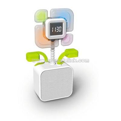 Folower shaped speaker with clock