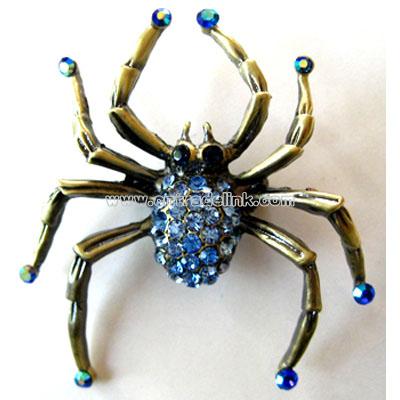 BRASS PLATED IRIDESCENT BLUE FEET SPIDER PIN BROOCH