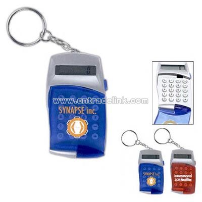 Keychain calculator with hinged cover and push button opening