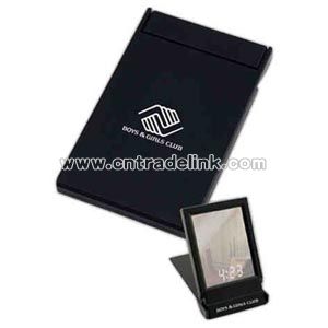 Folding travel mirror with clock