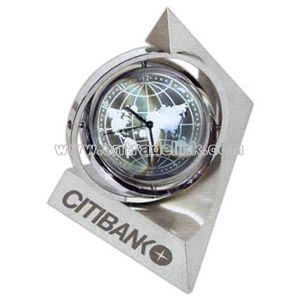 Spinning pyramid gyro globe clock