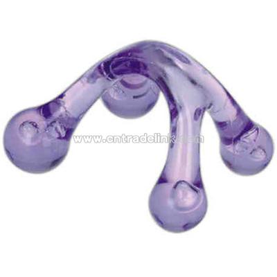 Translucent purple four legged massager