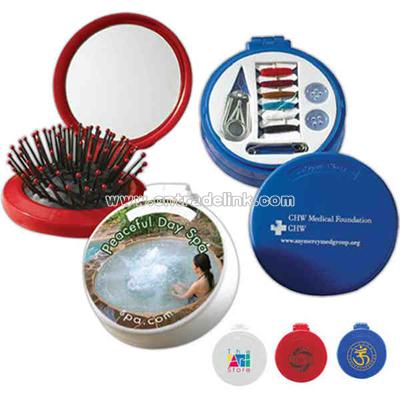 Round shape personal travel kit includes mirror, sewing kit and hairbrush