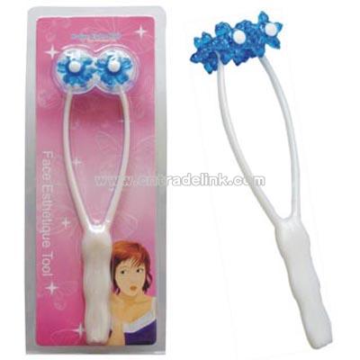 plastic face massager